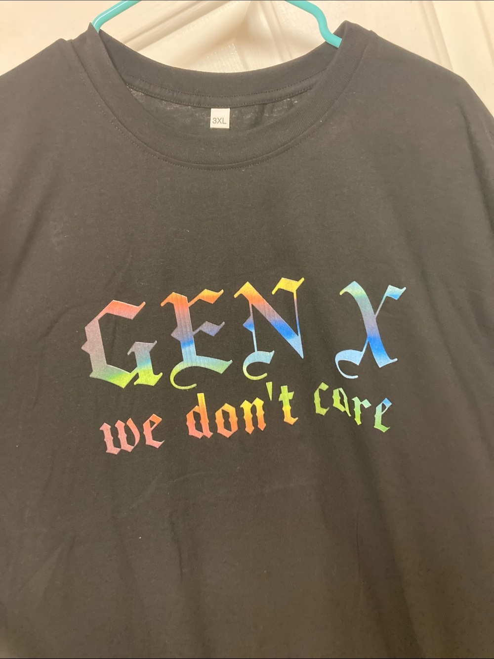 Black Crewneck T-Shirt with Rainbow 'GEN X we don't care' Graphic